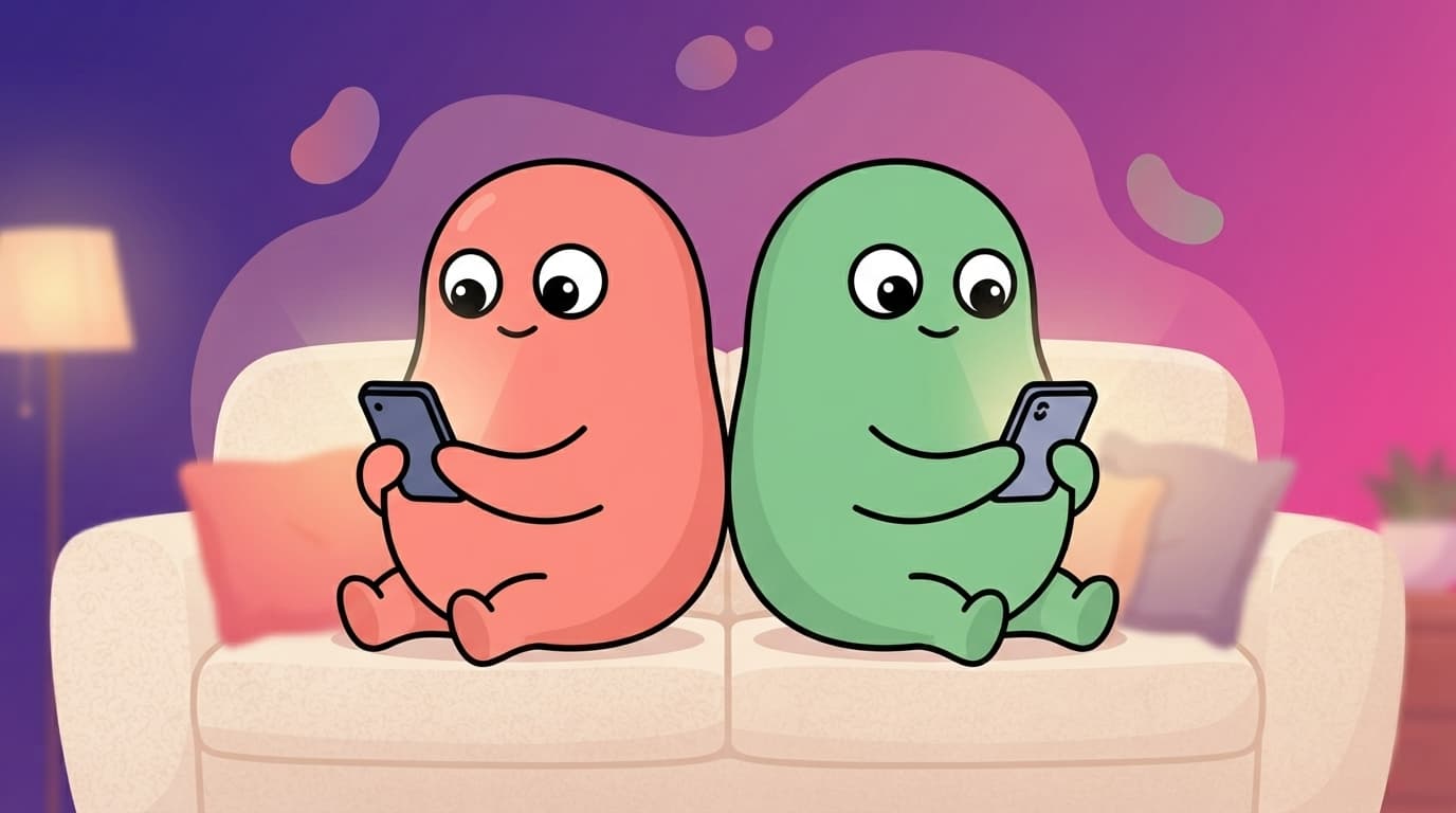 the coral and mint peek partners sit back to back on a sofa, each holding their own phone angled privately away from the other, a soft glow around each screen that the other can't see.