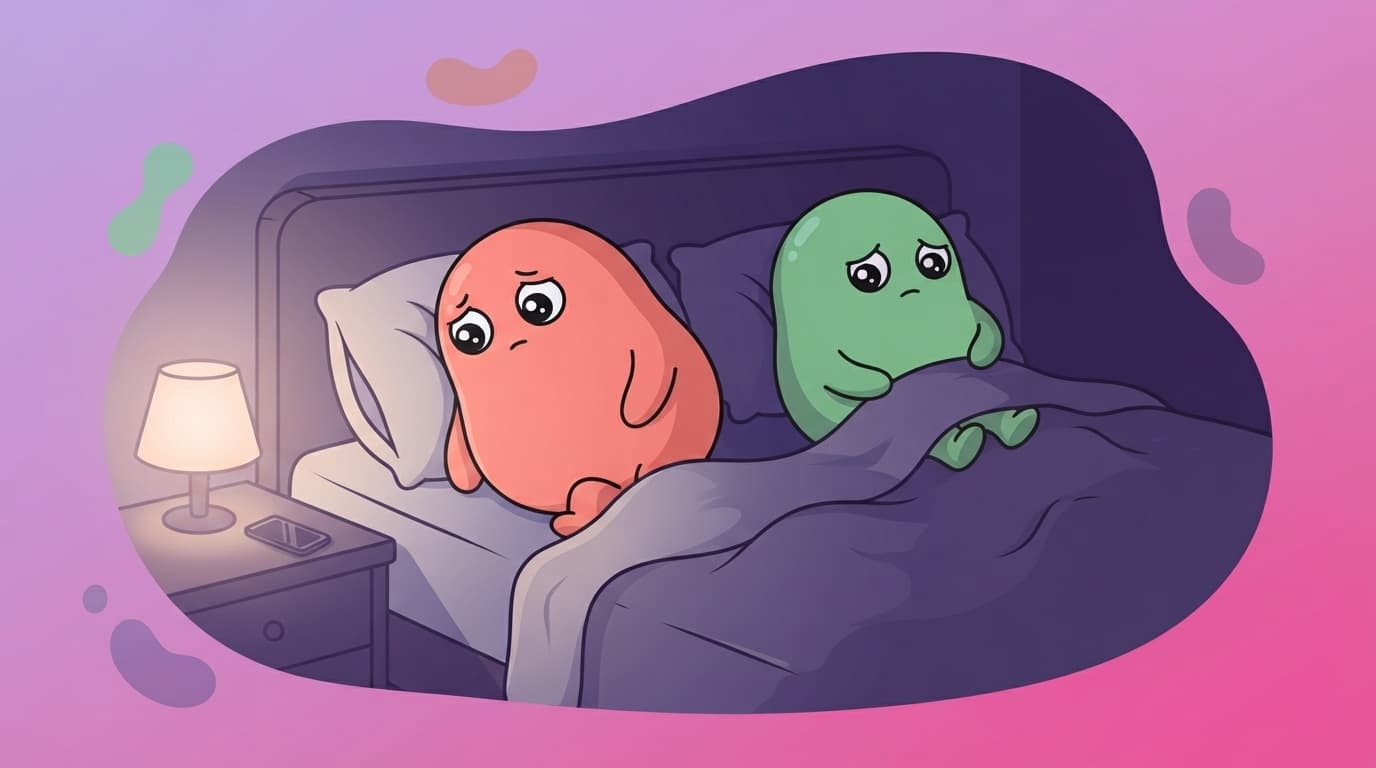 The coral and mint peek couple lying awake back to back in bed at night, a quiet gap of cool space between them.